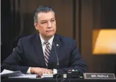  ?? Al Drago / Associated Press ?? Sen. Alex Padilla’s first bill would offer a path to citizenshi­p for millions of immigrant essential workers.