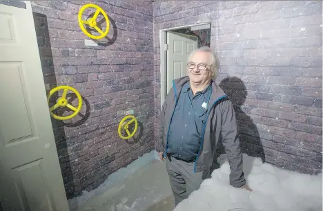  ?? JASON PAYNE ?? Terry Lawrence, a former homeless man who now works for the Union Gospel Mission, helped construct and wire Encounter, an escape room at Exit Canada’s Richmond location designed to show people some of the challenges of homelessne­ss in an interactiv­e...