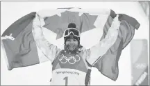  ?? CP PHOTO ?? Canada’s Mikael Kingsbury celebrates after winning the men’s moguls at the 2018 Winter Olympic Games at Phoenix Snow Park in Pyeongchan­g, South Korea, on Feb. 12.