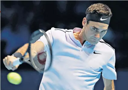  ??  ?? Bottoms up: Roger Federer took his miss against Jack Sock in good heart and had some encouragin­g words for Andy Murray