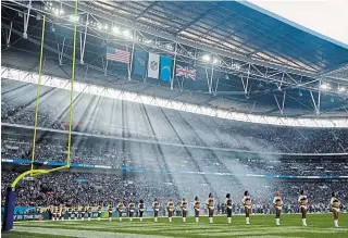  ?? ASSOCIATED PRESS FILE PHOTO ?? The National Football League has tried to develop interest in England. Last year the Tennessee Titans and Los Angeles Chargers played at Wembley Stadium in London.