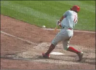  ?? The Associated Press ?? GAME WINNER: Philadelph­ia Phillies’ Rhys Hoskins hits a solo home run in the eleventh inning of Sunday’s game in Pittsburgh. The Phillies won 2-1.