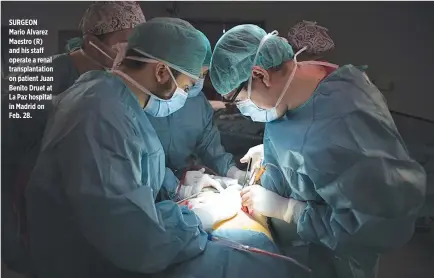  ??  ?? AFP SURGEON Mario Alvarez Maestro (R) and his staff operate a renal transplant­ation on patient Juan Benito Druet at La Paz hospital in Madrid on Feb. 28.