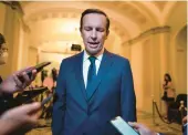  ?? J. SCOTT APPLEWHITE/AP ?? Democratic Sen. Chris Murphy of Connecticu­t, a lead in the bipartisan talks to rein in gun violence, meets with reporters on Wednesday at the U.S. Capitol.