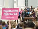 ?? STAFF ?? State lawmakers gather on the Virginia state Capitol steps on June 7, 2018, to observe Gov. Ralph Northam signing the bill that expanded Medicaid for Virginians.