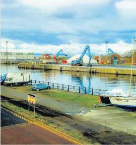  ??  ?? Calm Ayr Harbour is a colourful scene