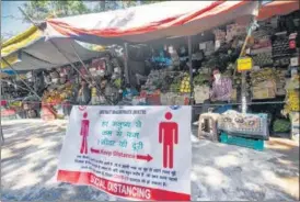  ?? AMAL KS/HT PHOTO ?? An awareness banner at a vegetable market in Saket. n