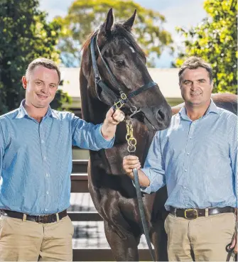 ?? Picture: JERAD WILLIAMS ?? New Magic Millions director Barry Bowditch and outgoing director Vin Cox.
