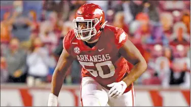  ?? Associated Press ?? Making an impact: Arkansas defender Eric Gregory against Tennessee during an NCAA football game during the 2020 season in Fayettevil­le. With plenty of depth, Arkansas is hoping their defensive line makes a big impact in 2021. The Razorbacks open the season next month against Rice.