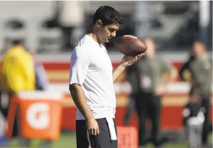  ?? Marcio Jose Sanchez / Associated Press ?? Jimmy Garoppolo, acquired 3½ weeks ago, has warmed up before the past two games but has yet to make his 49ers debut.