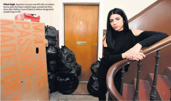  ??  ?? Piled high Agostina Lorusso was left with no option but to store the black rubbish bags outside her front door after Stirling Council failed to deliver designated purple bags to her