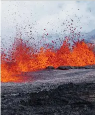  ?? Photo: EPA ?? Lava flows on the northeast side of Mauna Loa. Activity has spread from the top of the volcano to cracks on its flanks.