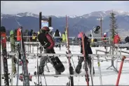  ?? Andy Cross / The Denver Post ?? Snow riders head out from the Summit House at the Keystone Resort in November 2020.