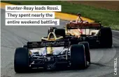  ??  ?? Hunter-reay leads Rossi. They spent nearly the entire weekend battling