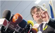  ??  ?? Ciudadanos supporters celebrate in Barcelona (main), as Mr Puigdemont speaks to the media in Brussels