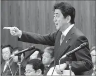  ?? AP/Kyodo News/YOSHINOBU SHIMIZU ?? Speaking to lawmakers Thursday in Tokyo, Japanese Prime Minister Shinzo Abe stressed the need to strengthen Japanese defenses against threats from North Korea.