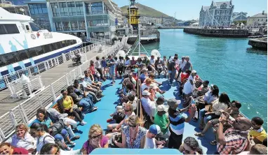  ?? PICTURE: DAVID RITCHIE ?? TAKEN FOR A RIDE: The Competitio­n Commission found five Robben Island ferries allegedly colluded to fix prices.