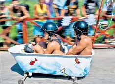  ??  ?? Good, clean fun: Red Bull’s 2010 race for chivichana­s (home-made go-karts) in Cuba