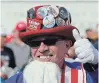  ?? THE ASSOCIATED PRESS ?? Will Enderly, dressed as Uncle Sam, gestures to friends before a campaign rally by U.S. President Donald Trump Thursday in Tampa, Fla.