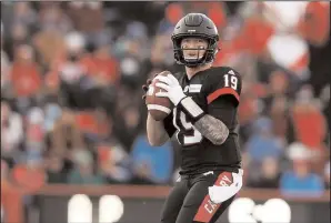  ?? CP PHOTO / TODD KOROL ?? Calgary Stampeders' quarterbac­k Bo Levi Mitchell looks to throw a pass during the second quarter of their CFL West Final football game against the Edmonton Eskimos in Calgary.