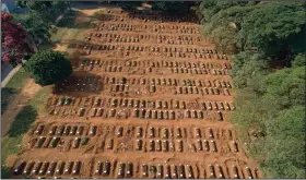  ?? (AP/Andre Penner) ?? Fresh graves fill Vila Formosa cemetery in Sao Paulo as Brazil emerges as Latin America’s coronaviru­s epicenter.