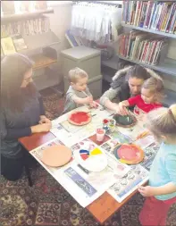  ??  ?? Bethany and Tommy Wolff, Kaila and Eliesha Murrowood and Hallie Wolff at Finley library.