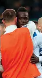  ??  ?? Brescia’s Mario Balotelli (left) reacts to Verona supporters’ racist chants during their Serie A match against Verona on Sunday.