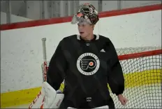  ?? SUBMITTED PHOTO – ZACK HILL ?? Carter Hart, looking somewhat trimmed down from his pre-pandemic game days, looks around the Skate Zone ice Monday during his first Flyers skating session since March.