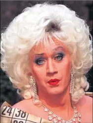  ??  ?? Paul O’Grady who has released a new book and his former alter ego Lily Savage