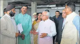  ?? HT PHOTO ?? Chief minister Manohar Lal Khattar reviewing the work at the upcoming All India Institute of Medical Sciences at Badhsa village of Jhajjar district on Monday.