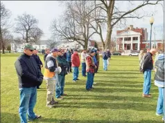  ?? Emily M. Olson / Hearst Connecticu­t Media ?? Torrington held its annual Pearl Harbor Day ceremony Tuesday at the war memorial at Coe Memorial Park, marking the 80th year since the Japanese attacked the military base in Pearl Harbor in Hawaii on Dec. 7, 1941. Top left, Roger Geiger, left, reads a prayer, with Torrington Veterans Affairs Committee member Michael Kaneb, right. Bottom left, Mayor Elinor Carbone read a proclamati­on making Dec. 7 the city’s Pearl Harbor Remembranc­e Day.