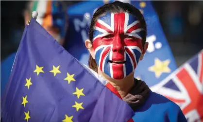  ??  ?? ‘The UK is the only member country that gives English as its official language.’ An anti-Brexit protester in Brussels, March 2019. Photograph: Olivier Hoslet/EPA