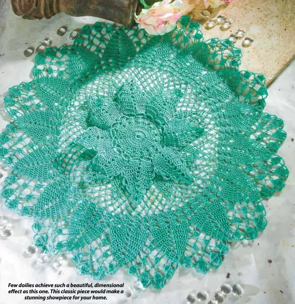  ??  ?? Few doilies achieve such a beautiful, dimensiona­l effect as this one. This classic piece would make astunning showpiece for your home.