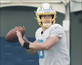  ?? Al Seib Los Angeles Times ?? JUSTIN HERBERT from Oregon was the Chargers’ first pick, sixth overall. He is second on the depth chart behind veteran quarterbac­k Tyrod Taylor.