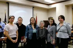  ?? ?? From left, Jamie Wilson, Lorraine Murtha, Dana Burke, Karla Nelson, Melody Tolbert and Abbey Thomas pose together. Wilson, Murtha, Burke, Tolbert and Thomas all spoke out against Nelson’s November firing from her position as children’s librarian at the Barton Library during a meeting of the Union County Public Library System Board on Tuesday, Feb. 28. (Caitlan Butler/News-Times)