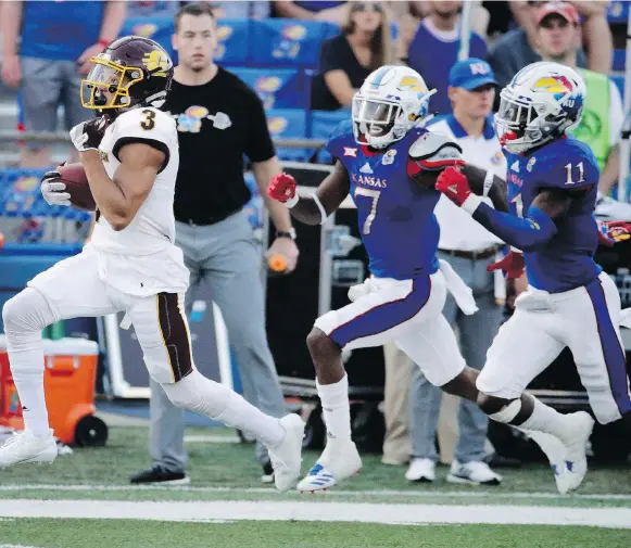  ?? CHARLIE RIEDEL/THE ASSOCIATED PRESS FILE ?? Hamilton Tiger-cats No. 1 pick Mark Chapman, left, is one of the high-profile CFL prospects to join the upstart Alliance of American Football.