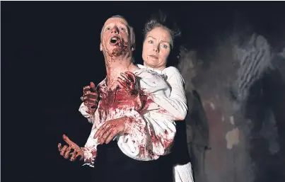  ?? Picture: Getty. ?? Jonathan Slinger as Macbeth and Aislin McGuckin as Lady Macbeth in the Royal Shakespear­e Company’s production of William Shakespear­e’s Macbeth.