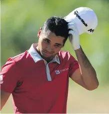  ?? VAUGHN RIDLEY/ GETTY IMAGES ?? Defending champion Jason Day is scratching his head over the way he’s played the last two days of the Canadian Open. He didn’t even read his final putt on the 18th hole Friday.