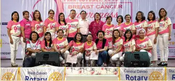  ??  ?? THE LADIES of the Host Club, the Rotary Club of Downtown Davao with RI D3860 Gov. Philip N. Tan, PDG Art O. Tan, City Health Officer, Dr. Josephine J. Villafuert­e and Ms. Bibeth Orteza (kneeling in front row)