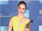  ??  ?? Wonder Woman Gal Gadot took home the trophy for rising star at Tuesday night’s gala. FRAZER HARRISON/GETTY IMAGES