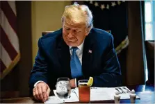  ?? AL DRAGO/GETTY IMAGES ?? President Donald Trump, at a lunch meeting with GOP lawmakers Tuesday at the White House, said the ruling to uphold his third version of the travel ban was “a moment of profound vindicatio­n.”