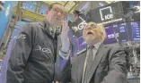  ?? RICHARD DREW/AP ?? Traders at the NYSE on Tuesday.