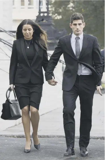  ??  ?? Ched Evans and his fiancee Natasha Massey leave the Cardiff court after the verdict