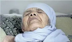  ?? DAVID KEYTON/THE ASSOCIATED PRESS ?? Afghan refugee Bibihal Uzbeki lies in bed in Hova, Sweden, on Sunday. Despite being severely disabled and barely able to speak, the 106 year old is facing deportatio­n after her asylum applicatio­n was rejected.