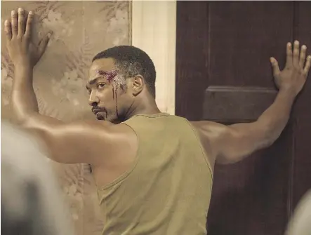  ??  ?? Anthony Mackie plays a sombre Vietnam veteran in Kathryn Bigelow’s racially charged Detroit.