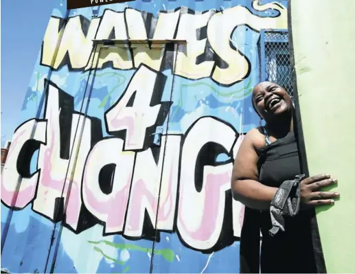  ?? Pictures: Esa Alexander ?? It takes Annelissa Mhloli, above, 20 minutes to get into her wetsuit, she says. Then she’s ready to lead her young charges from Khayelitsh­a into the sea at Muizenberg to discover the joy of surfing.