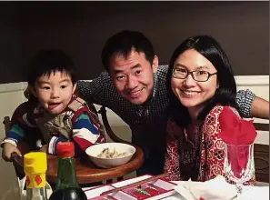  ?? — AP ?? Fighting for his freedom: An undated photo of Wang with his wife Hua Qu and their son.