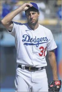  ?? PHOTOS BY MARCIO JOSE SANCHEZ AND JOHN MCCOY — THE ASSOCIATED PRESS ?? Trea Turner, left, was the leadoff hitter the Dodgers needed with Mookie Betts out, and is now a dependable middle-of-the-order presence. Max Scherzer is 6-0with a 0.88ERA in eight starts with the Dodgers. Both were acquired from the Nationals in a deal that was completed July 30.