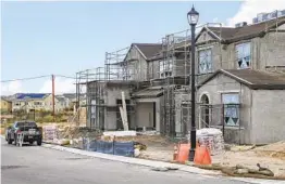  ??  ?? These homes in the Sendero Collection community in Pacific Highlands Ranch are still under constructi­on.