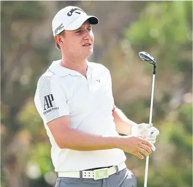  ?? AFP ?? Emiliano Grillo, en la práctica para su primer torneo del año en el PGA tour, en hawaii